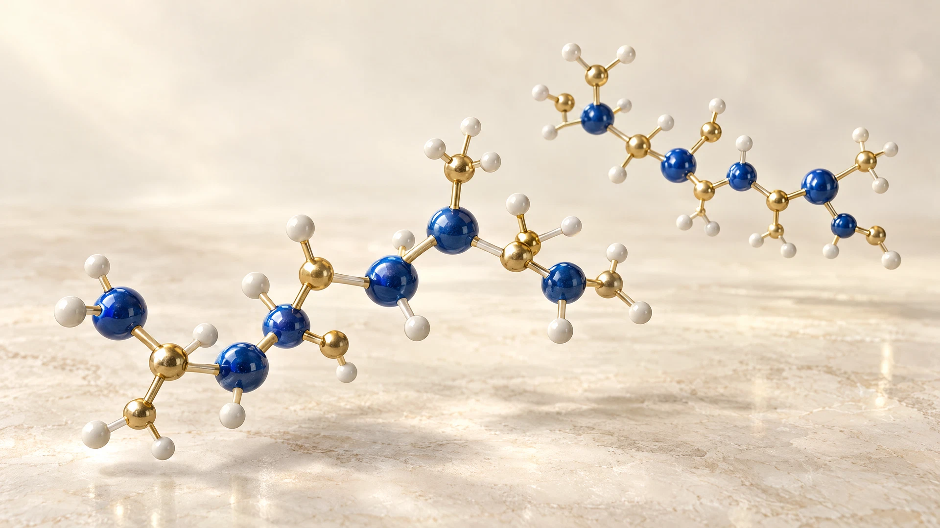 Conceptual peptide-like molecular chains shown as blue and gold ball-and-stick forms on an ivory background